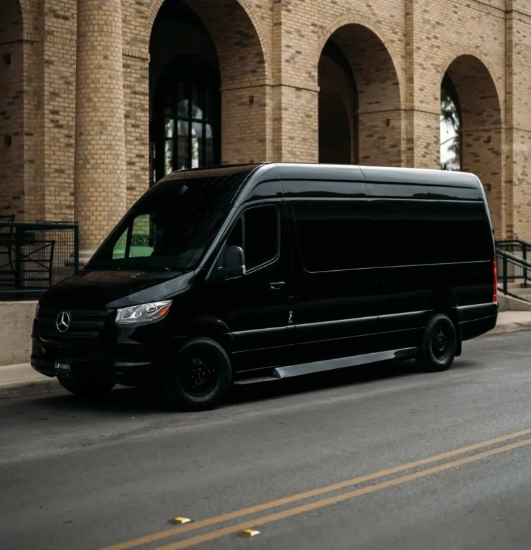 Private black Sprinter van offering discreet luxury transportation and personalized comfort